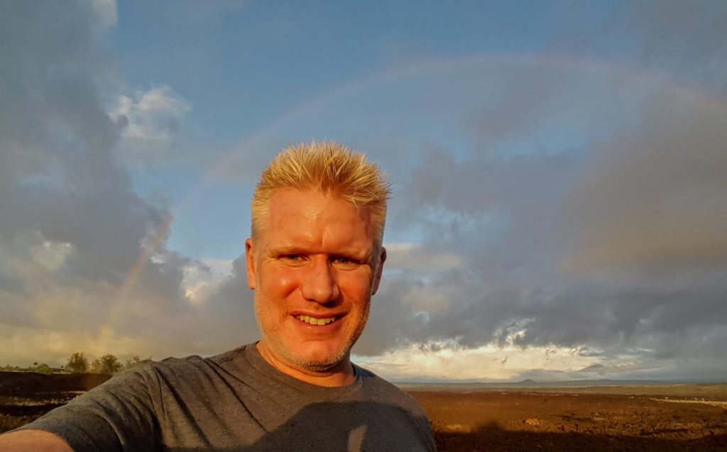 Christian Espinosa, catching a rainbow on the Big Island of Hawaii (Kona)