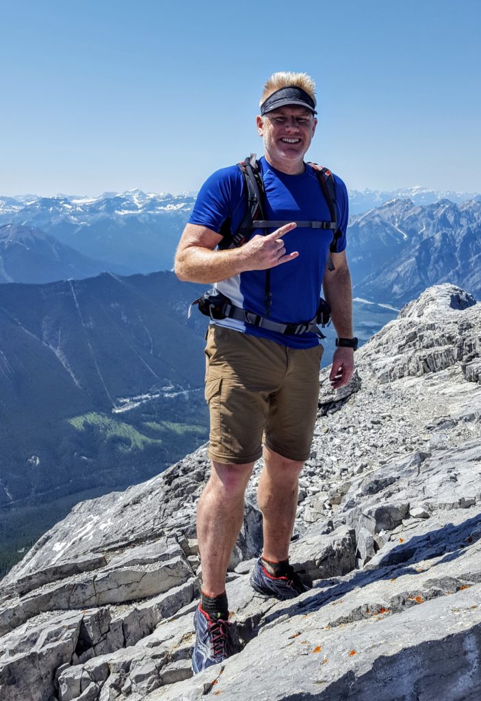 Christian at Mt Rundle summit in Banff National Park, Canada.